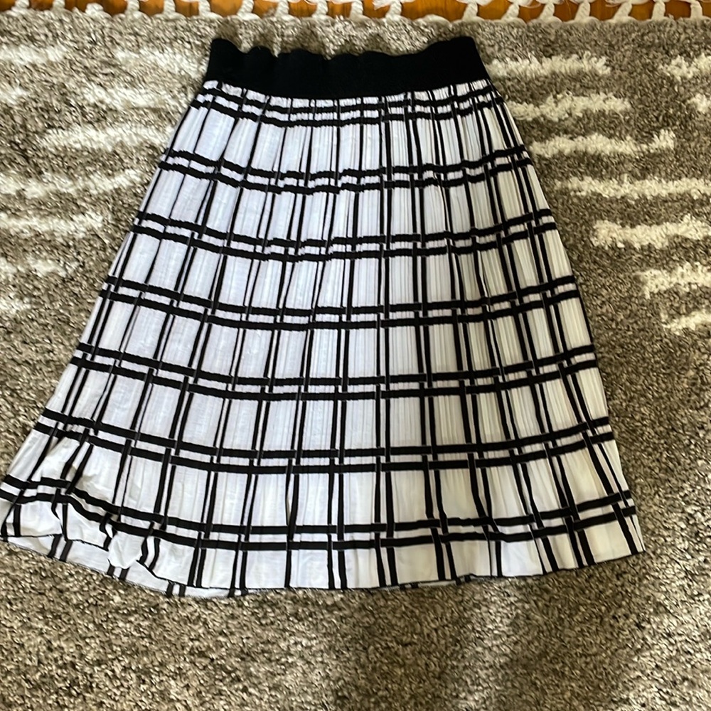 Black and white plaid pleated mid length skirt